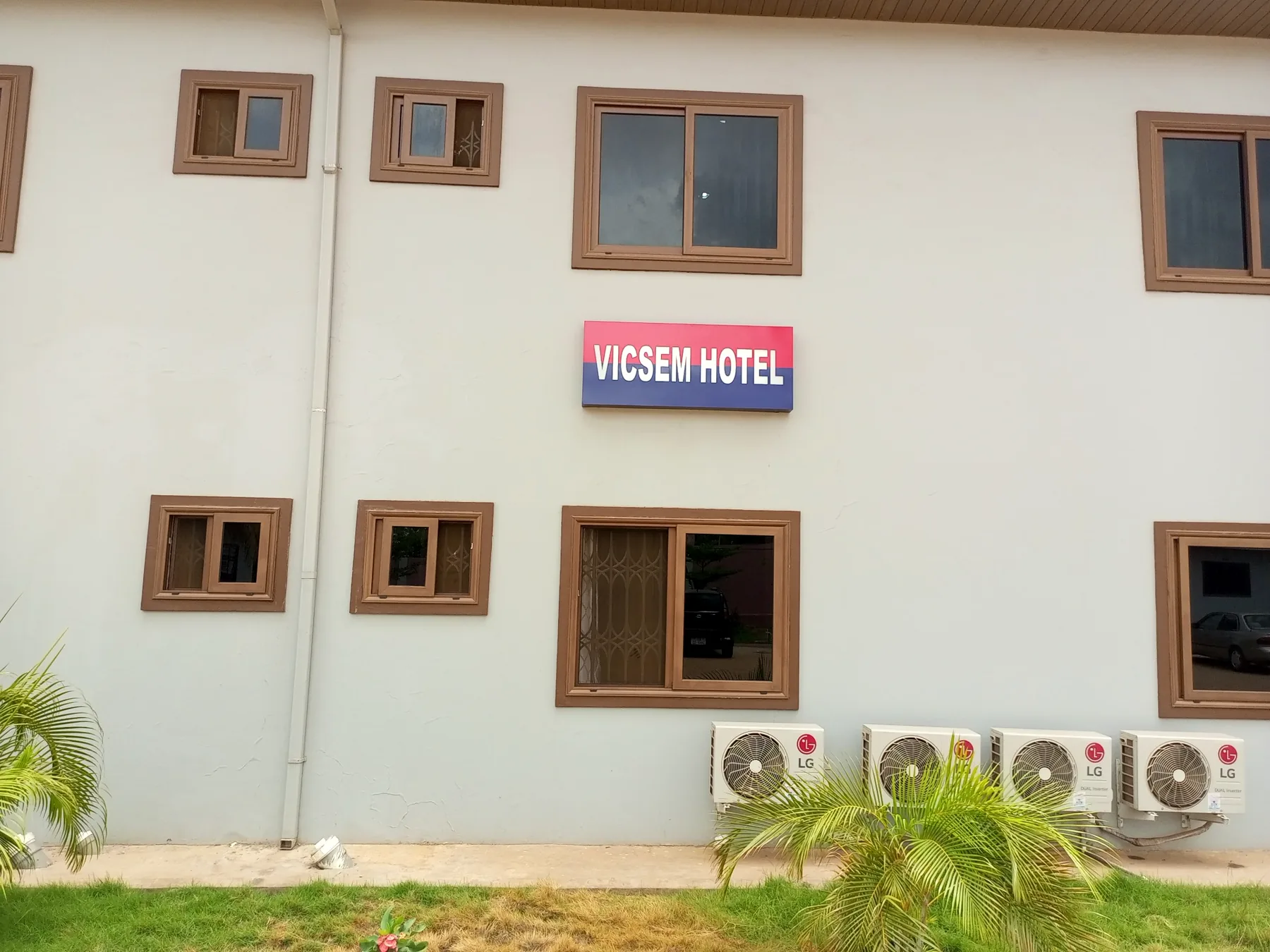 Vicsem Hotel signage on guest wing